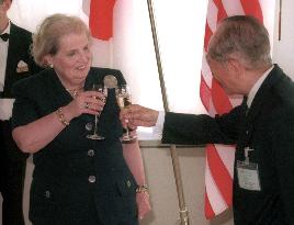 Albright toasts at reception in Miyazaki